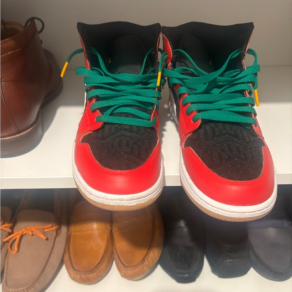 Jordan Red and Black Athletic Shoes with Green Laces